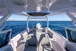 Axopar 29 Suntop - 2025 Axopar 29 Suntop boat interior with seating, open sea view, and modern design.