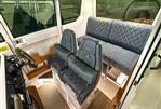 Axopar 28 CABIN - Interior of 2021 Axopar 28 CABIN boat with luxurious seating and modern design.