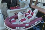 Azimut 43S - 2009 Azimut 43S yacht with a small red and white inflatable boat docked.