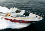 Azimut 43S - 2009 Azimut 43S yacht cruising on open water, showcasing sleek design and luxury features.