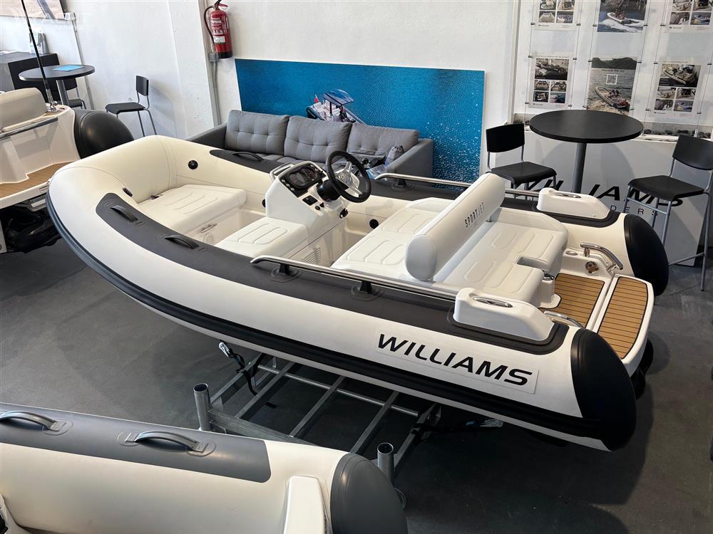 Williams Jet Tenders Sportjet 345 - 2025 Williams Jet Tenders Sportjet 345 displayed in showroom, featuring sleek design and modern seating.