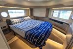 Absolute 52 Navetta - Luxurious bedroom interior of 2021 Absolute 52 Navetta yacht with elegant bedding.