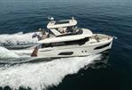 Absolute 52 Navetta - Luxury Absolute 52 Navetta yacht cruising on open water, 2021 model.