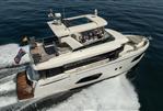 Absolute 52 Navetta - Luxury Absolute 52 Navetta yacht cruising on open water, 2021 model.