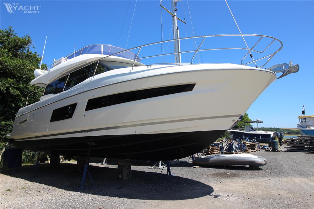 Prestige 460 - 2019 Prestige 460 yacht on dry dock under clear blue sky.