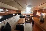 Sunseeker Camargue 50 - Luxurious interior of 2001 Sunseeker Camargue 50 yacht with elegant wood finishes.