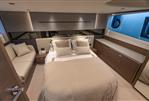 Princess V50 Open - Luxurious bedroom interior of 2023 Princess V50 Open yacht, featuring elegant design and modern furnishings.