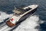 Princess V48 Open - 2017 Princess V48 Open yacht cruising on open water, rear view.