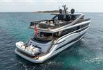 Princess X95 - Luxurious 2023 Princess X95 yacht cruising in clear blue waters.