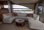 Princess 60 - Luxurious interior of 2015 Princess 60 yacht with elegant seating and scenic water view.