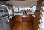 Princess 49 - Luxurious interior of 2017 Princess 49 yacht with modern kitchen and seating area.