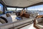 Princess F58 - Luxurious interior of 2025 Princess F58 yacht with elegant seating and panoramic windows.