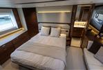 Princess F58 - Luxurious 2025 Princess F58 yacht bedroom with modern design and elegant furnishings.