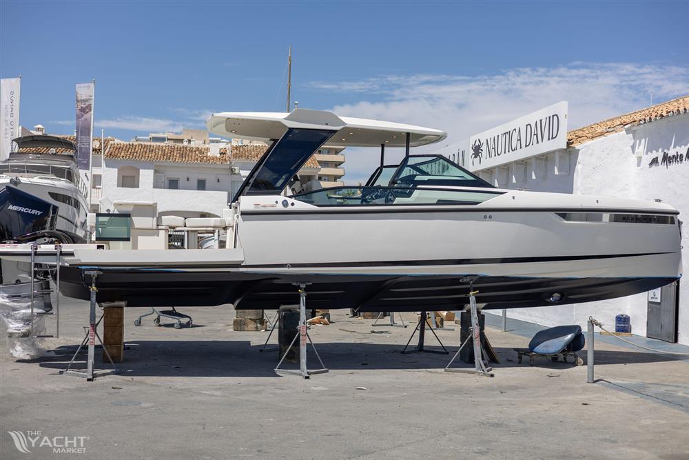 Saxdor 320 GTO - 2025 Saxdor 320 GTO boat displayed at a marina, elevated on stands.