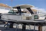 Saxdor 320 GTO - 2025 Saxdor 320 GTO boat displayed at Motonautica dealership under clear blue sky.