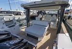 Saxdor 400 GTO - 2025 Saxdor 400 GTO luxury yacht interior with seating and modern amenities at a marina.