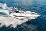 Princess V40 - 2019 Princess V40 yacht cruising on open sea, creating dynamic water splashes.