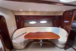 Princess V48 - Luxurious interior of 2007 Princess V48 yacht with elegant seating and wooden table.