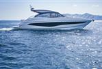 Princess V50 Open - 2024 Princess V50 Open yacht cruising on a sunny ocean.