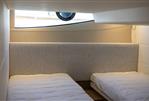Princess V40 - Twin beds in a 2019 Princess V40 yacht cabin, featuring a modern interior design.