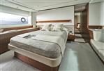 Princess F65 - Luxurious bedroom interior of 2025 Princess F65 yacht with elegant design and sea view.