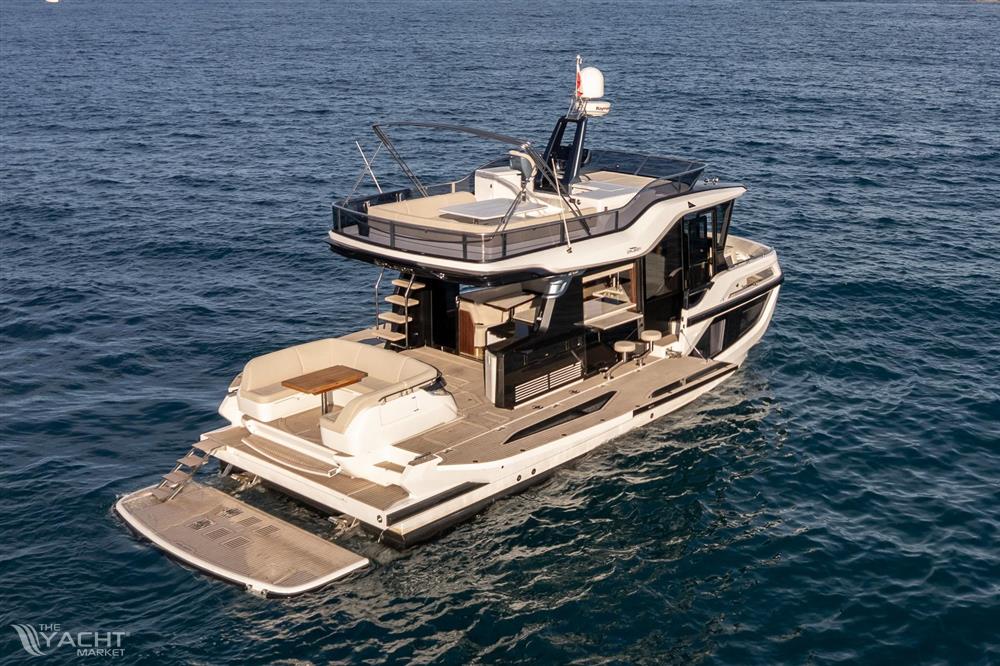 Galeon 430 Explorer - 2025 Galeon 430 Explorer yacht cruising on open sea, showcasing luxury design and spacious deck.