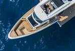 Saxdor 400 GTS - Aerial view of 2025 Saxdor 400 GTS yacht cruising on blue ocean waters.