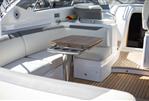 Princess V40 - Luxurious 2019 Princess V40 yacht interior with elegant seating and wooden table.
