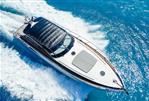 Princess V58 - Luxurious 2005 Princess V58 yacht cruising on vibrant blue ocean waters.
