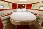 Fairline Targa 52 GT - Luxurious cabin interior of 2006 Fairline Targa 52 GT yacht with elegant bedding.