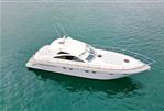 Fairline Targa 52 GT - 2006 Fairline Targa 52 GT yacht cruising on clear blue water.