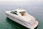 Fairline Targa 52 GT - 2006 Fairline Targa 52 GT luxury yacht on calm ocean waters.