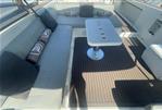 VanDutch 40 - Luxurious seating area on a 2010 VanDutch 40 yacht with modern table and cushions.