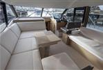 Prestige 420 - Luxurious interior of 2022 Prestige 420 yacht with modern seating and helm station.