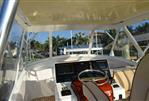 Custom Carolina Dixon Boatworks Express - Center Teak Helm Pod With A Recently New Enclosure.