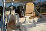 Custom Carolina Dixon Boatworks Express - Teak Decking On Bridge Deck And Aft Facing Bench Seat To Right Of Helm.   Copy