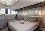 Galeon 620 FLY - Luxurious bedroom interior of 2025 Galeon 620 FLY yacht with modern decor and ambient lighting.