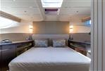 Galeon 620 FLY - Luxurious bedroom interior of 2025 Galeon 620 FLY yacht with modern design.