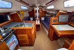Westerly GK33 - Interior of 1999 Westerly GK33 sailboat with wood finish and navigation station.