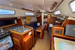 Westerly GK33 - Interior of 1999 Westerly GK33 sailboat with wood finish and navigation equipment.