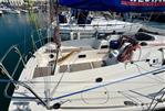 Westerly GK33 - 1999 Westerly GK33 sailboat docked in marina, featuring spacious deck and rigging.