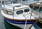 Maritime 21 - 1992 Maritime 21 boat named "Lady Jane" docked in a marina.