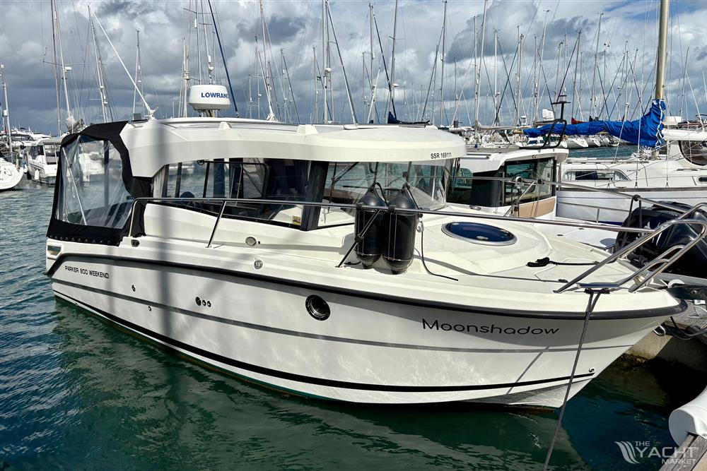 Parker Poland 800 Weekend - 2017 Parker Poland 800 Weekend boat docked in a marina, named &quot;Moonshadow.&quot;