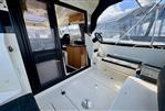 Parker Poland 800 Weekend - Interior view of 2017 Parker Poland 800 Weekend boat, featuring helm and seating area.