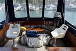 Lochin Fast Fisher - Interior of a 1996 Lochin Fast Fisher boat with seating and equipment.
