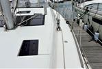 Dufour 412 Grand Large - 2018 Dufour 412 Grand Large yacht docked at marina, side deck view.