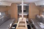 Dufour 37 - Interior of 2025 Dufour 37 yacht with modern furnishings and cozy cabin layout.