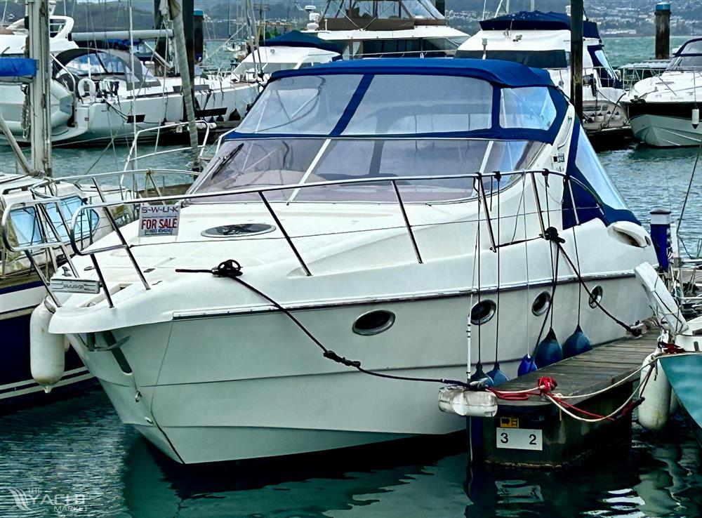 Gobbi 345SC - 2005 Gobbi 345SC yacht docked, featuring sleek design and &quot;For Sale&quot; sign.