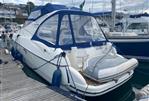 Gobbi 345SC - 2005 Gobbi 345SC yacht docked at marina with blue canopy and fenders.