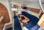 Gobbi 345SC - Luxurious interior of a 2005 Gobbi 345SC yacht with elegant seating and wood accents.